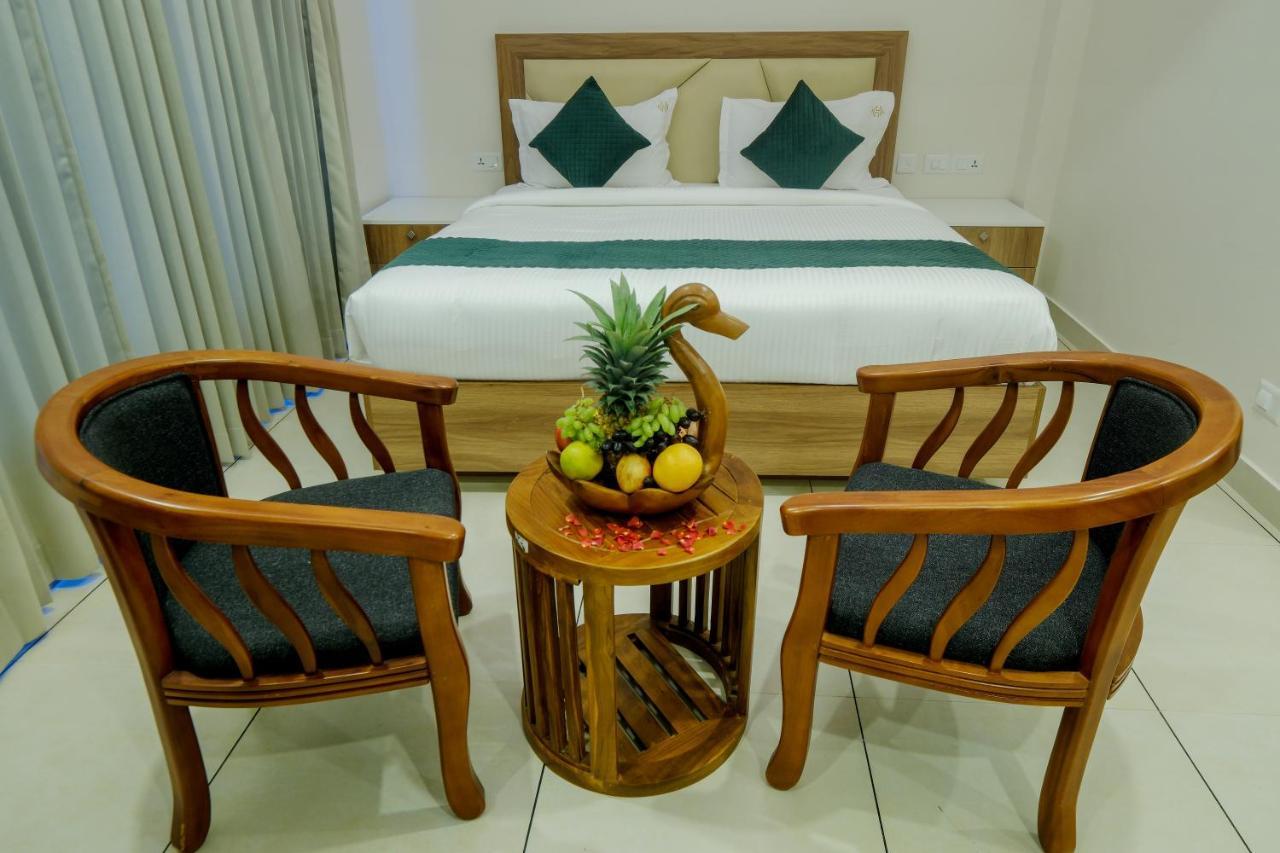 The Heartland Business Hotel, Trivandrum Thiruvananthapuram Buitenkant foto